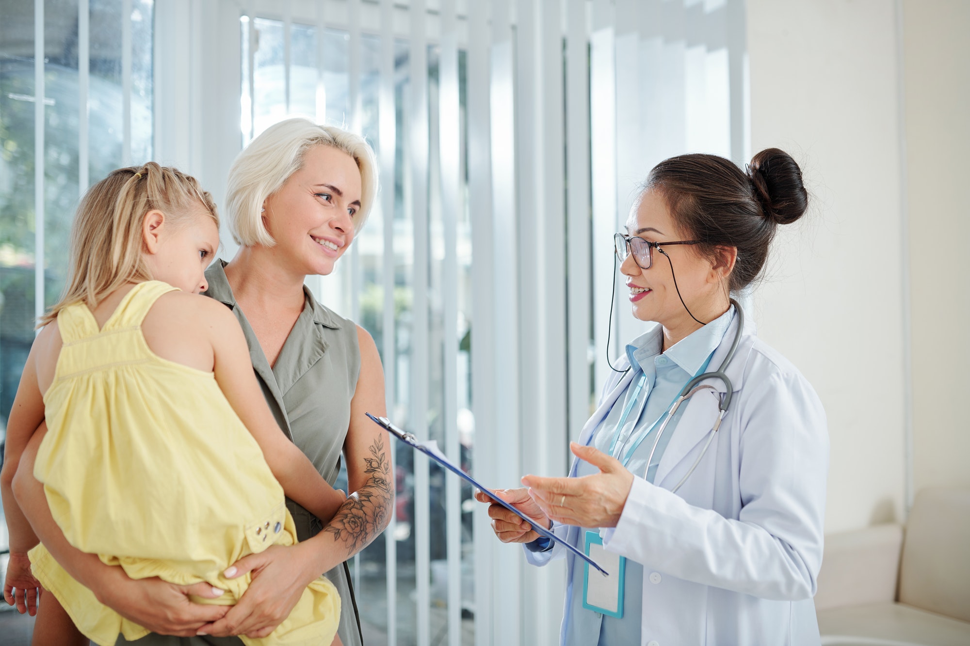 pediatrician-talking-to-mother-of-girl.jpg